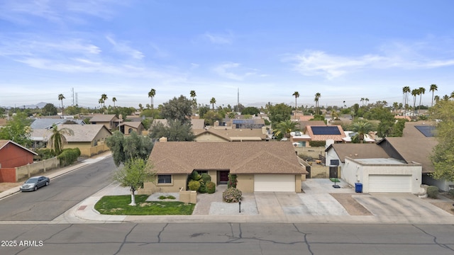 birds eye view of property with a residential view