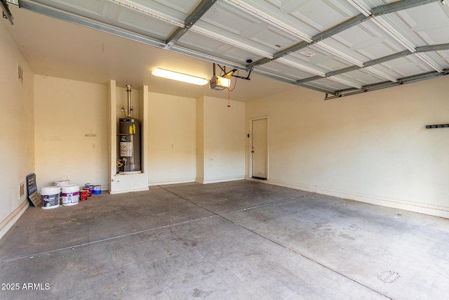 garage featuring a garage door opener and water heater