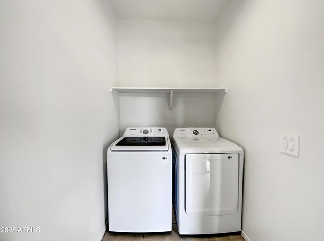 35337 W San Alvarez Ave, Maricopa, AZ 85138 - laundry room with washer and dryer and baseboards