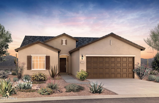 view of front of house with a garage