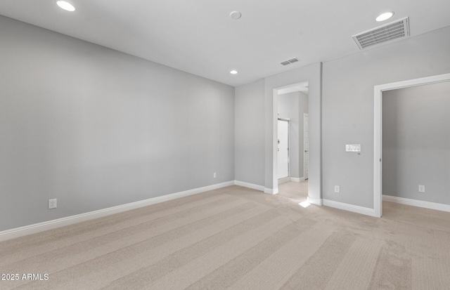 2851 N Coronado Dr, Florence, AZ 85132 - unfurnished bedroom featuring light carpet, baseboards, visible vents, and recessed lighting