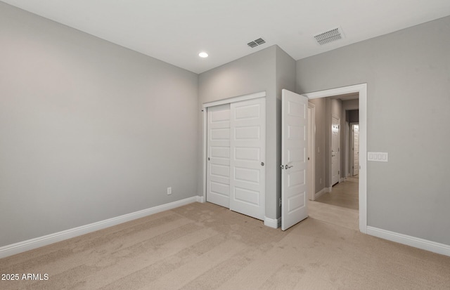 2851 N Coronado Dr, Florence, AZ 85132 - unfurnished bedroom featuring light colored carpet, visible vents, and baseboards
