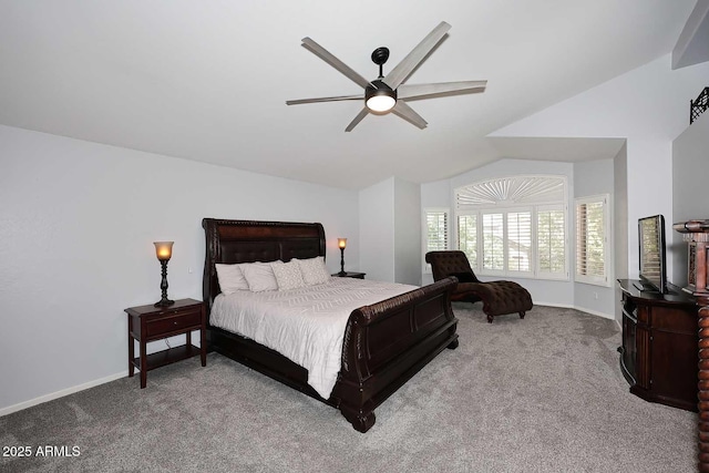 carpeted bedroom with lofted ceiling, baseboards, and a ceiling fan