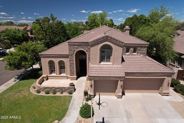 mediterranean / spanish-style house featuring a tile roof, a chimney, concrete driveway, and stucco siding