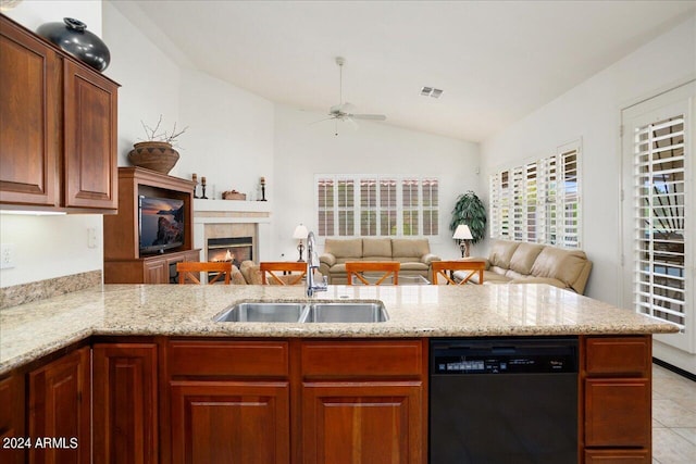 kitchen featuring kitchen peninsula, lofted ceiling, sink, and dishwasher