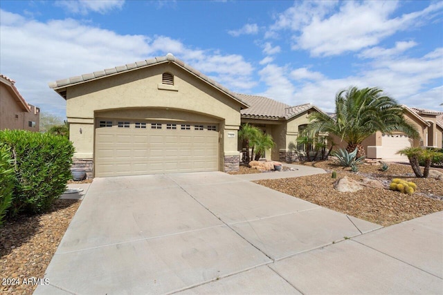 view of front of property featuring a garage