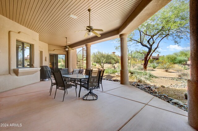 view of patio featuring ceiling fan and grilling area