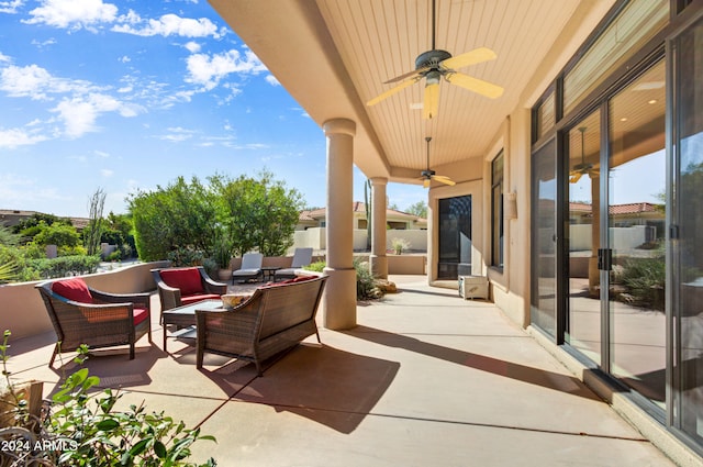 view of patio featuring an outdoor hangout area and ceiling fan