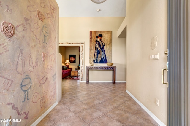 hallway featuring tile patterned floors