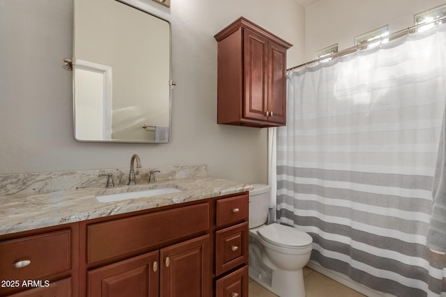 full bathroom featuring vanity, tile patterned flooring, a shower with curtain, and toilet
