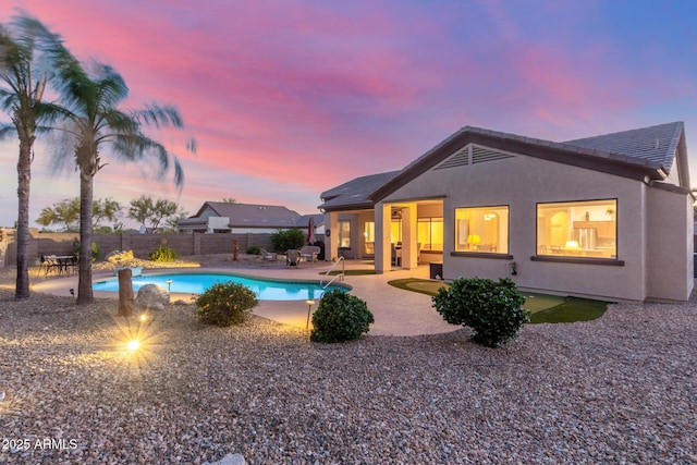 view of pool with a patio, a fenced backyard, and a fenced in pool