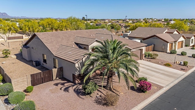 birds eye view of property with a residential view