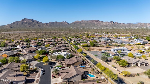 drone / aerial view with a residential view and a mountain view