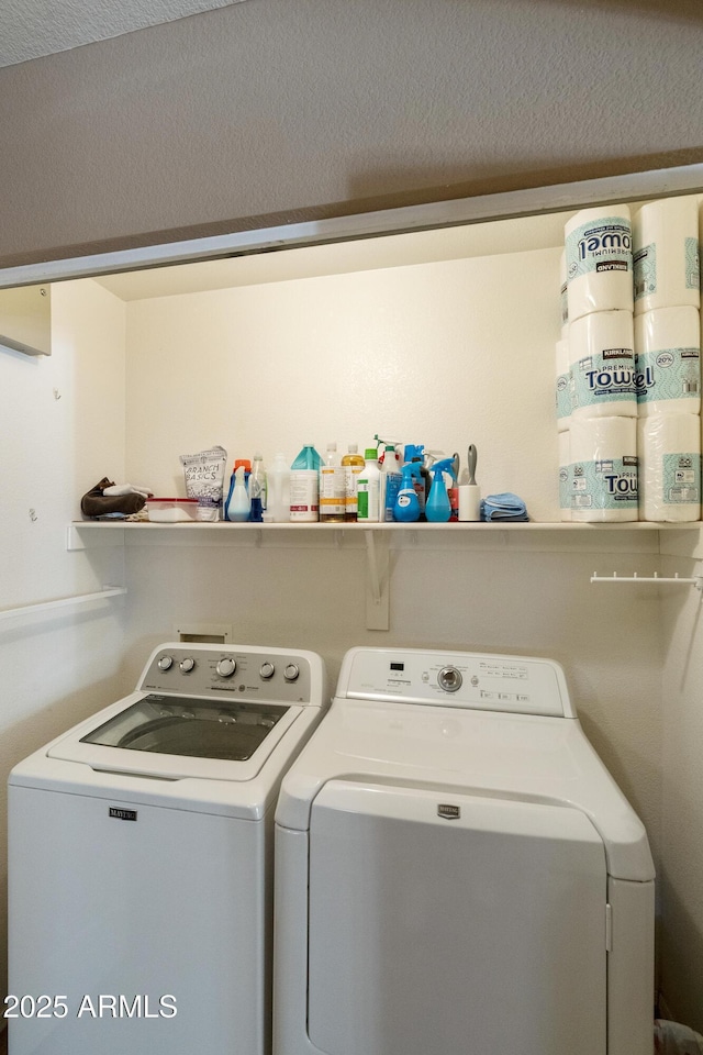 laundry room featuring washer and dryer