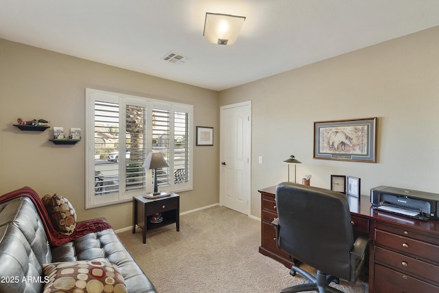 home office featuring light colored carpet