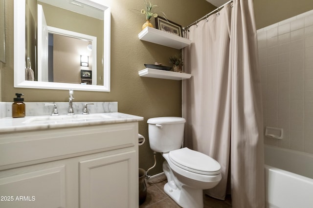 full bathroom featuring vanity, toilet, tile patterned flooring, and shower / bath combo