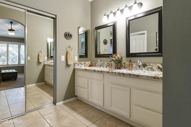 bathroom with vanity, tile patterned floors, and ceiling fan