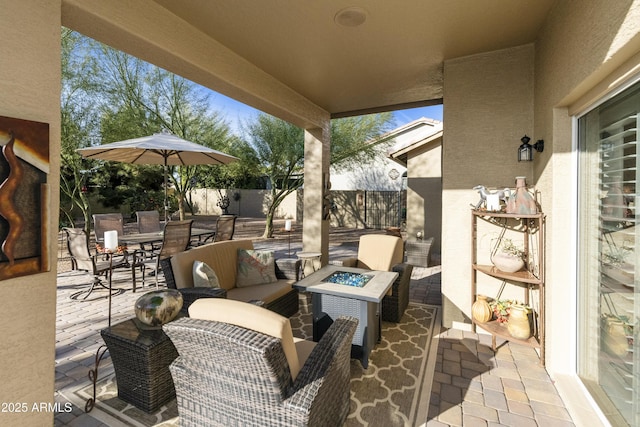 view of patio / terrace featuring an outdoor fire pit