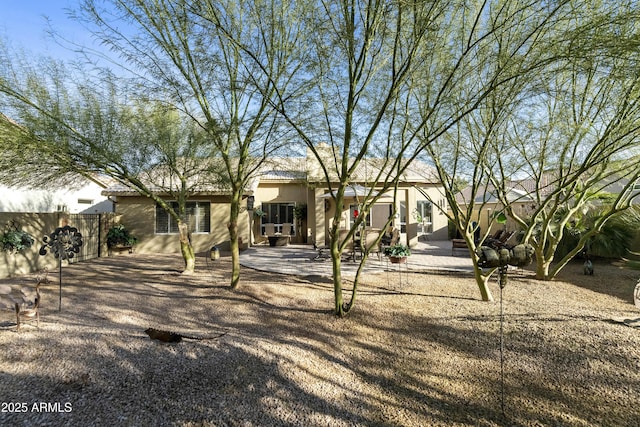 view of front of home featuring a patio area