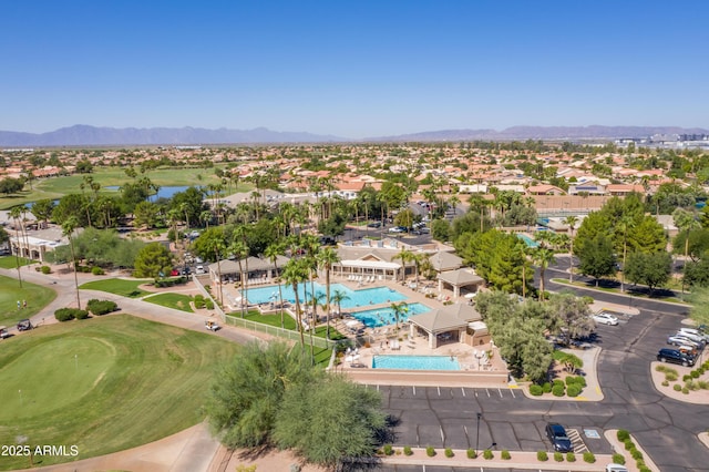 birds eye view of property featuring a mountain view