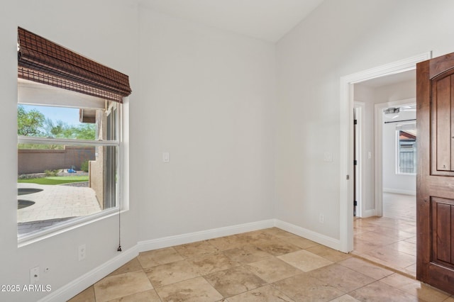 10450 E Terra Dr, Scottsdale, AZ 85258 - unfurnished room with plenty of natural light and baseboards