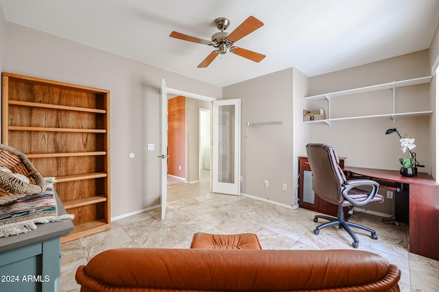 home office featuring ceiling fan and french doors