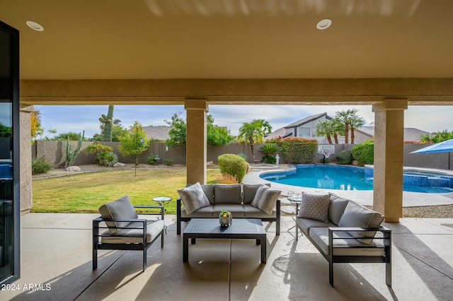 view of swimming pool with an in ground hot tub, a patio, and an outdoor hangout area