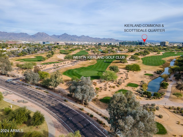 birds eye view of property featuring a mountain view