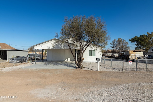 view of front of property with a carport