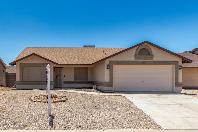 6317 E Colby St, Mesa, AZ 85205 - single story home featuring stucco siding, a garage, roof with shingles, and driveway