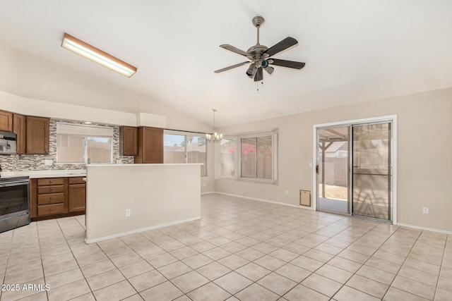 6317 E Colby St, Mesa, AZ 85205 - kitchen with appliances with stainless steel finishes, lofted ceiling, ceiling fan, a chandelier, and brown cabinetry