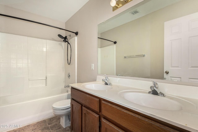 6317 E Colby St, Mesa, AZ 85205 - bathroom with toilet, double vanity, and bathtub / shower combination
