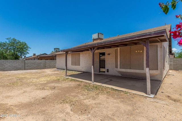 6317 E Colby St, Mesa, AZ 85205 - back of property with a patio area and a fenced backyard