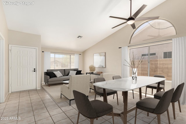 6317 E Colby St, Mesa, AZ 85205 - dining area featuring vaulted ceiling, light tile patterned flooring, and ceiling fan