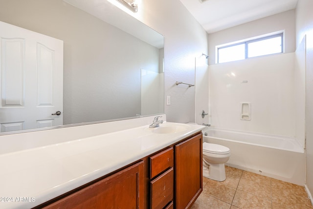 full bath with  shower combination, vanity, toilet, and tile patterned floors