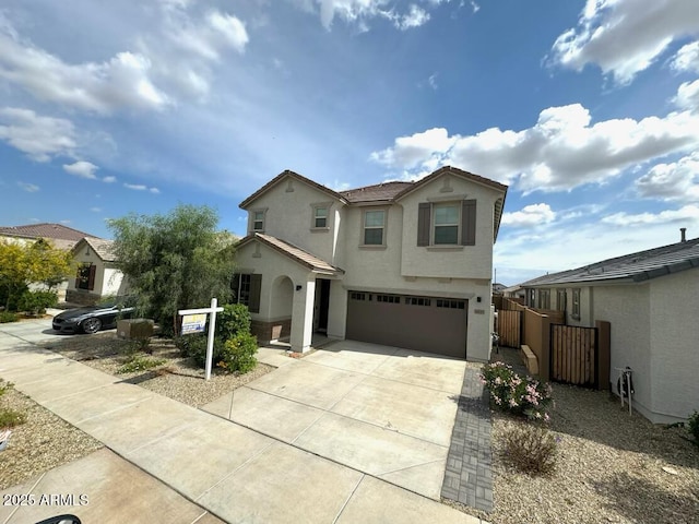 14245 W El Cortez Pl, Surprise, AZ 85387 - view of front facade with stucco siding, a garage, and driveway