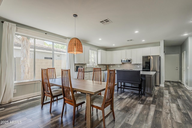 3062 E Cullumber St, Gilbert, AZ 85234 - dining room featuring dark wood-style flooring and recessed lighting