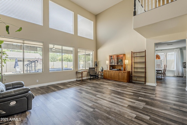 3062 E Cullumber St, Gilbert, AZ 85234 - living area with a high ceiling and dark wood-style flooring