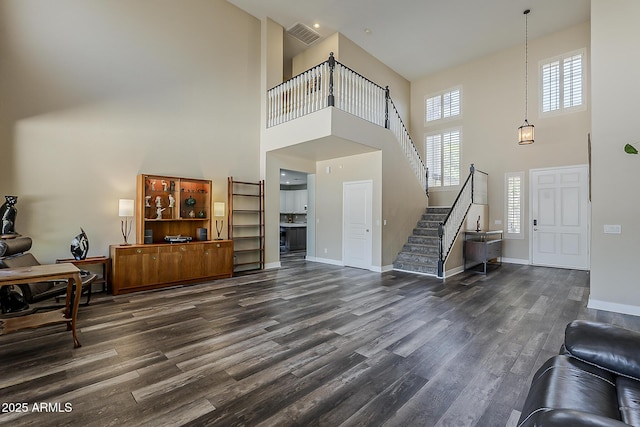 3062 E Cullumber St, Gilbert, AZ 85234 - living room with a towering ceiling, dark wood-style flooring, and stairway