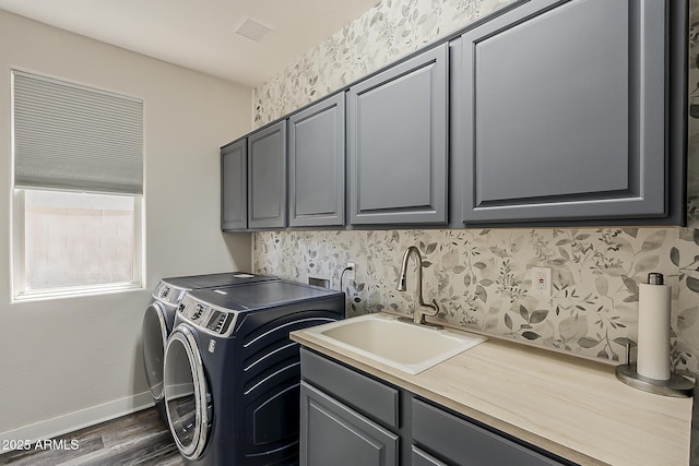 3062 E Cullumber St, Gilbert, AZ 85234 - laundry room with cabinet space, washing machine and clothes dryer, and dark wood-style flooring