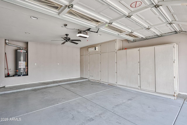 garage with gas water heater, a garage door opener, and ceiling fan