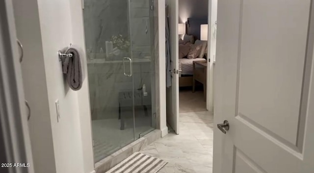 bathroom featuring an enclosed shower