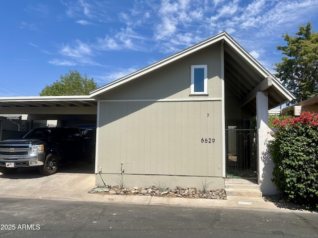 6629 N Majorca Way E, Phoenix, AZ 85016 - garage featuring an attached carport