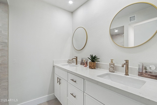 6629 N Majorca Way E, Phoenix, AZ 85016 - bathroom with double vanity and baseboards