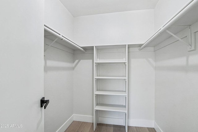 6629 N Majorca Way E, Phoenix, AZ 85016 - walk in closet with wood finished floors