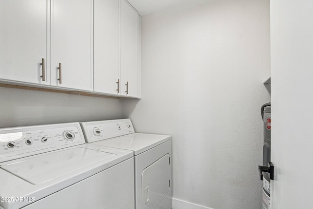 6629 N Majorca Way E, Phoenix, AZ 85016 - laundry area featuring cabinet space, separate washer and dryer, and baseboards
