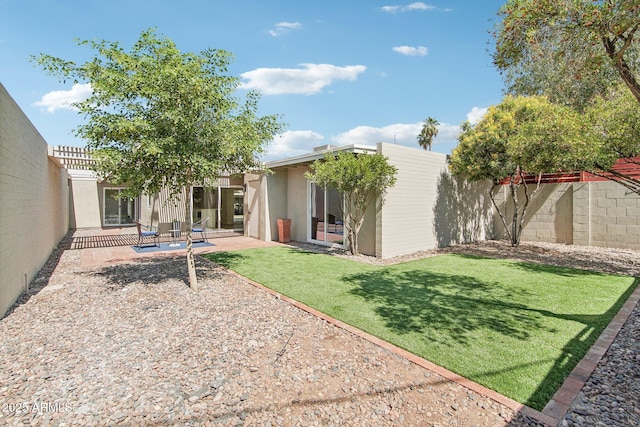 6629 N Majorca Way E, Phoenix, AZ 85016 - back of house with stucco siding and a patio area
