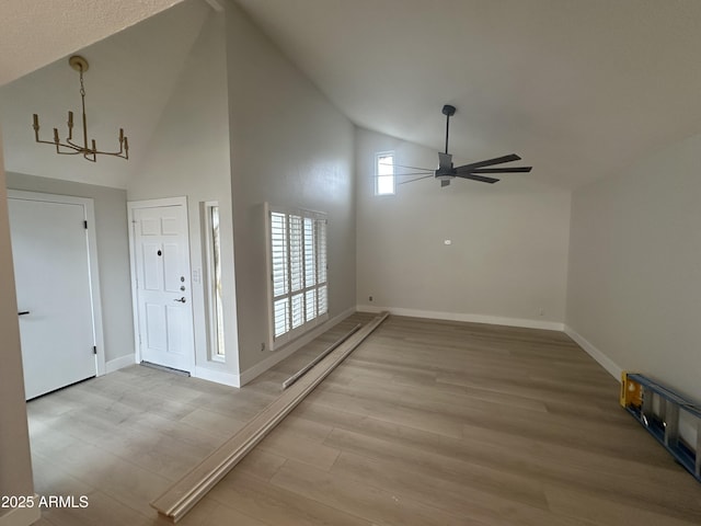 6629 N Majorca Way E, Phoenix, AZ 85016 - entryway featuring a ceiling fan, high vaulted ceiling, light wood finished floors, and baseboards
