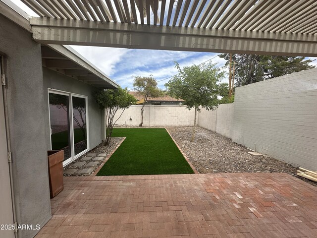 6629 N Majorca Way E, Phoenix, AZ 85016 - fenced backyard featuring a patio and a pergola