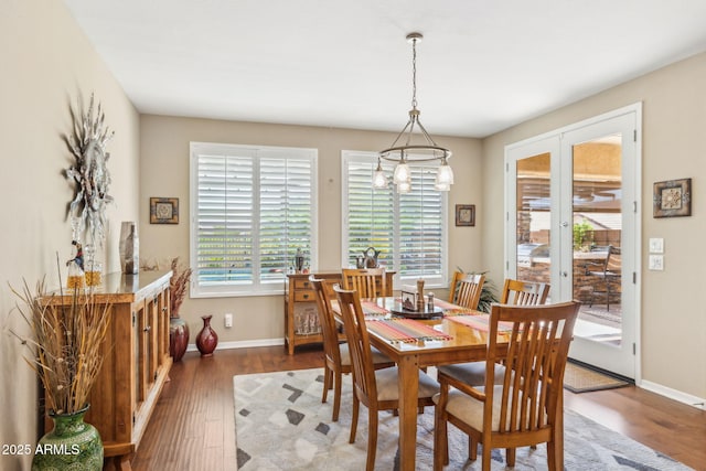 33305 N 26th Ave, Phoenix, AZ 85085 - dining space with wood finished floors and a chandelier